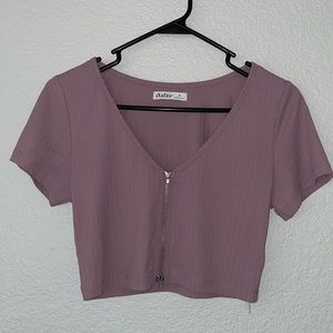 Size M Cropped Purple Top with Zipper.
Brand: Aster